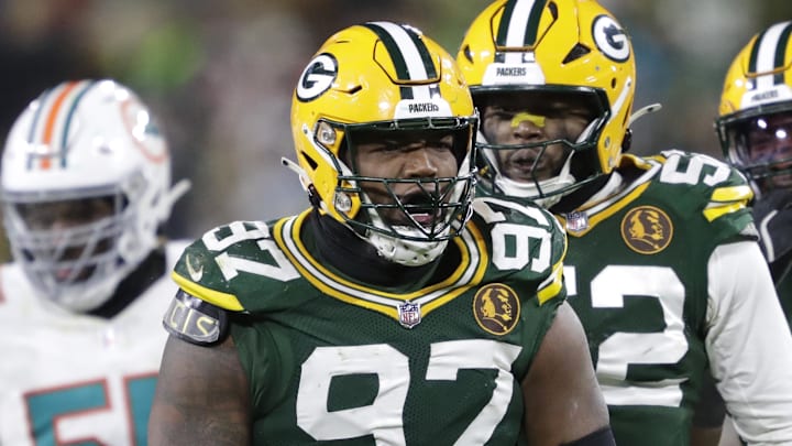 Green Bay Packers defensive tackle Kenny Clark (97) celebrates sacking Miami Dolphins quarterback Tua Tagovailoa. It was his only sack of the season. Green Bay Packers defensive tackle Kenny Clark (97) celebrates sacking Miami Dolphins quarterback Tua Tagovailoa. It was his only sack of the season.