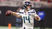 Dec 7, 2025; Atlanta, Georgia, USA; Seattle Seahawks quarterback Sam Darnold (14) throws a pass against the Atlanta Falcons in the third quarter at Mercedes-Benz Stadium. 