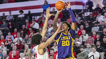 Feb 5, 2025; Athens, Georgia, USA; LSU Tigers forward Derek Fountain (20) shoots over Georgia Bulldogs forward Asa Newell (14) during the first half at Stegeman Coliseum. Mandatory Credit: Dale Zanine-Imagn Images