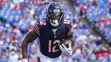 Aug 10, 2024; Orchard Park, New York, USA; Chicago Bears wide receiver Velus Jones Jr. (12) runs with the ball for a touchdown against the Buffalo Bills during the second half at Highmark Stadium. Mandatory Credit: Gregory Fisher-Imagn Images