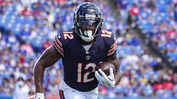Aug 10, 2024; Orchard Park, New York, USA; Chicago Bears wide receiver Velus Jones Jr. (12) runs with the ball for a touchdown against the Buffalo Bills during the second half at Highmark Stadium. Mandatory Credit: Gregory Fisher-Imagn Images