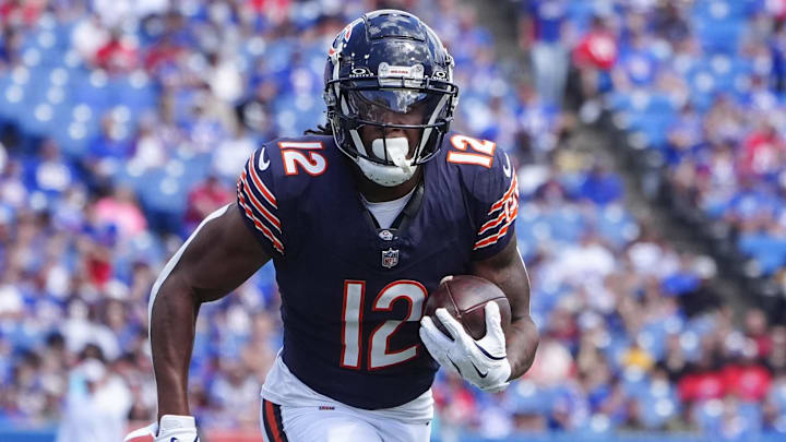 Aug 10, 2024; Orchard Park, New York, USA; Chicago Bears wide receiver Velus Jones Jr. (12) runs with the ball for a touchdown against the Buffalo Bills during the second half at Highmark Stadium. Mandatory Credit: Gregory Fisher-Imagn Images