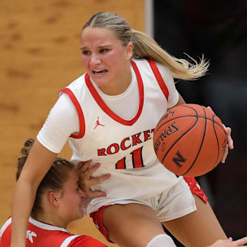Neenah High School's Rowan Klesmit (11) drives through the lane during a girls basketball game Friday, December 6, 2024.