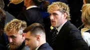 Boxer Jake Paul and wrestler Logan Paul sit in the viewing area in the Emancipation Hall on the Inauguration Day of Donald Trump's second presidential term in Washington, U.S. January 20, 2025.
