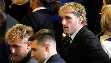 Boxer Jake Paul and wrestler Logan Paul sit in the viewing area in the Emancipation Hall on the Inauguration Day of Donald Trump's second presidential term in Washington, U.S. January 20, 2025.