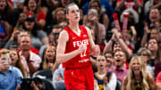 Jul 6, 2024; Indianapolis, Indiana, USA; Indiana Fever guard Caitlin Clark (22) celebrates after scoring against the New York Liberty at Gainbridge Fieldhouse. Mandatory Credit: Grace Smith/INDIANAPOLIS STAR-USA TODAY Sports