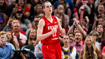 Jul 6, 2024; Indianapolis, Indiana, USA; Indiana Fever guard Caitlin Clark (22) celebrates after scoring against the New York Liberty at Gainbridge Fieldhouse. Mandatory Credit: Grace Smith/INDIANAPOLIS STAR-USA TODAY Sports