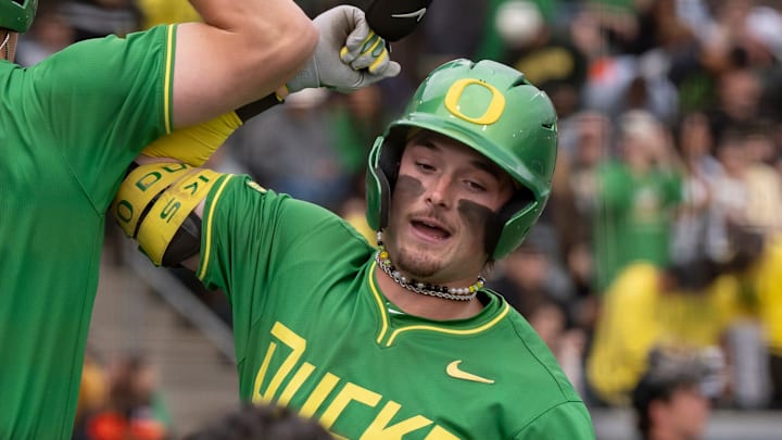 Oregon outfielder Mason Neville, right, celebrates a home run with teammate Drew Smith as the Oregon Ducks host the Oregon State Beavers on April 25, 2025, at PK Park in Eugene. Oregon outfielder Mason Neville, right, celebrates a home run with teammate Drew Smith as the Oregon Ducks host the Oregon State Beavers on April 25, 2025, at PK Park in Eugene.