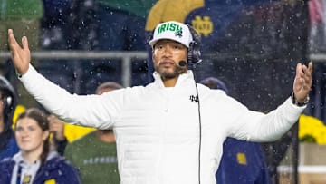 Oct 18, 2025; South Bend, Indiana, USA;  Notre Dame Fighting Irish head coach Marcus Freeman reacts to the play against the Southern California Trojans during the second half at Notre Dame Stadium. 