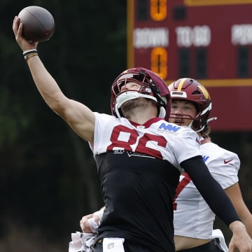 Jul 25, 2024; Ashburn, VA, USA; Washington Commanders tight end Zach Ertz (86) catches a pass on day two of Commanders training camp at OrthoVirginia Training Center at Commanders Park. Mandatory Credit: Geoff Burke-USA TODAY Sports