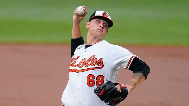 Jul 27, 2022; Baltimore, Maryland, USA; Baltimore Orioles starting pitcher Tyler Wells (68) throws a pitch against the Tampa Bay Rays