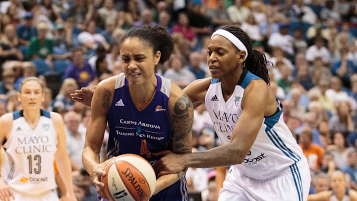 Jun 27, 2015; Minneapolis, MN, USA; Minnesota Lynx forward Asjha Jones (15) fouls Phoenix Mercury forward Candice Dupree (4) in the second quarter  at Target Center. Mandatory Credit: Brad Rempel-Imagn Images