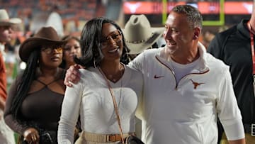 Nov. 24, 2024.:Texas Longhorns head coach Steve Sarkisian and his wife Loreal Sarkisian walk off the field.