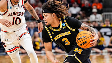 Michigan guard Tre Donaldson (3) 