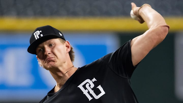 West Potomac High School pitcher Austin Dean during the 2024 Perfect Game National Showcase high school baseball game at Chase Field. West Potomac High School pitcher Austin Dean during the 2024 Perfect Game National Showcase high school baseball game at Chase Field.