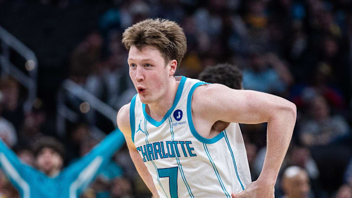 Feb 26, 2026; Indianapolis, Indiana, USA; Charlotte Hornets guard Kon Knueppel (7) celebrates a made basket in the second half against the Indiana Pacers at Gainbridge Fieldhouse. Mandatory Credit: Trevor Ruszkowski-Imagn Images