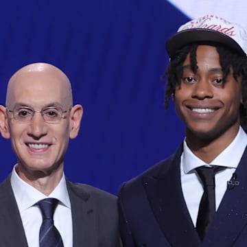 Jun 25, 2025; Brooklyn, NY, USA;  Tre Johnson stands with NBA commissioner Adam Silver after being selected as the sixth pick by the Washington Wizards in the first round of the 2025 NBA Draft at Barclays Center. Mandatory Credit: Brad Penner-Imagn Images
