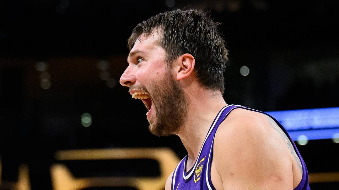 Mar 27, 2026; Los Angeles, California, USA; Los Angeles Lakers forward Rui Hachimura (28) and guard Luka Doncic (77) react after a defensive play during the first half against the Brooklyn Nets at Crypto.com Arena. Mandatory Credit: William Liang-Imagn Images