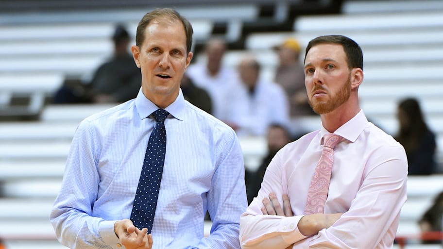 Syracuse Orange assistant head coach Mike Hopkins and assistant coach Gerry McNamara look on ahead of a game.