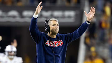 Nov 28, 2025; Tempe, Arizona, USA; Arizona Wildcats head coach Brent Brennan celebrates against the Arizona State Sun Devils in the second half during the 99th Territorial Cup at Mountain America Stadium. Mandatory Credit: Mark J. Rebilas-Imagn Images