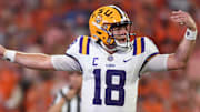 LSU Tigers quarterback Garrett Nussmeier yells downfield.