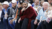 Dec 1, 2021; Oklahoma City, Oklahoma, USA; Rapper, singer and actor Drake watches the Oklahoma City Thunder take on the Houston Rockets during the second half of an Oklahoma City Thunder game at Paycom Center. Mandatory Credit: Alonzo Adams-Imagn Images