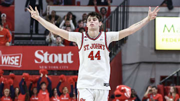 Nov 9, 2024; Queens, New York, USA;  St. John's basketball forward Brady Dunlap (44) celebrates after making a three-point shot in the second half against the Quinnipiac Bobcats at Carnesecca Arena. Mandatory Credit: Wendell Cruz-Imagn Images