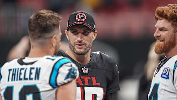 Atlanta Falcons backup QB Kirk Cousins chats with Adam Thielen and Andy Dalton after the final regular season game of the 2024 season.
