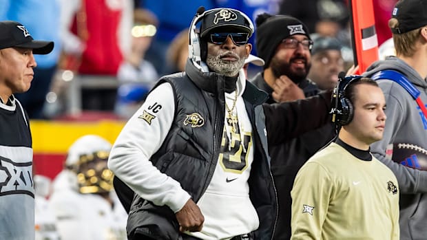 Colorado head coach Deion Sanders watches the run of play during the 3rd quarter between the Kansas Jayhawks and Colorado.