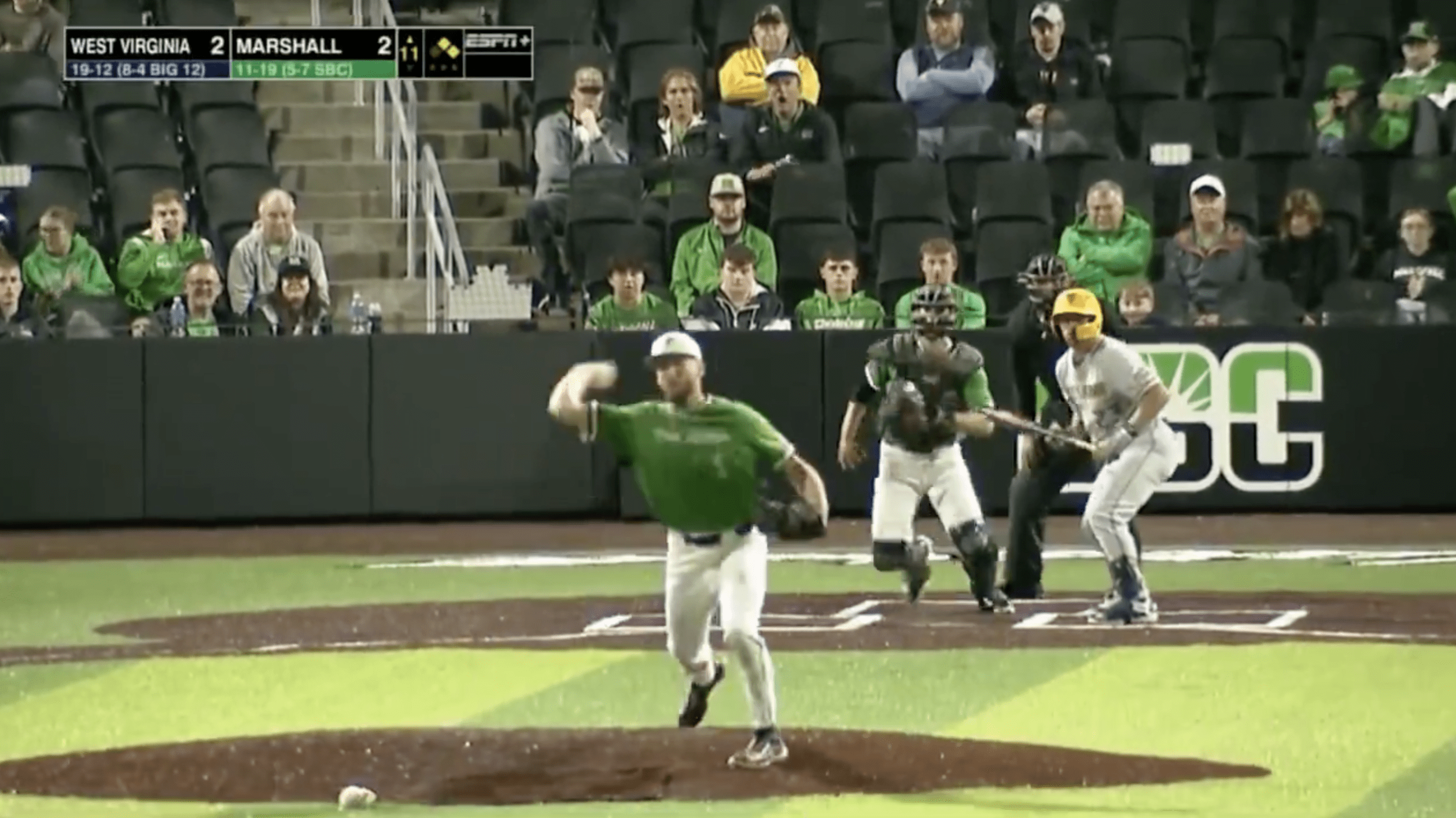 Screenshot from video of Marshall pitcher picking off runner
