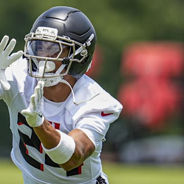 Jun 11, 2025; Atlanta, GA, USA; Atlanta Falcons cornerback A.J. Terrell (24) catches the ball during Minicamp.