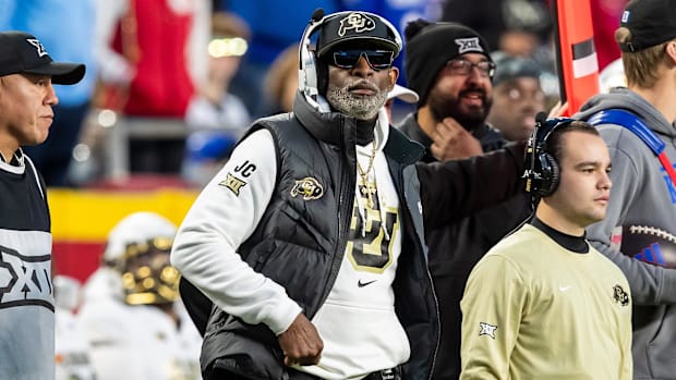 Nov 23, 2024; Kansas City, Missouri, USA;  Colorado head coach Deion Sanders watches the run of play during the 3rd quarter b