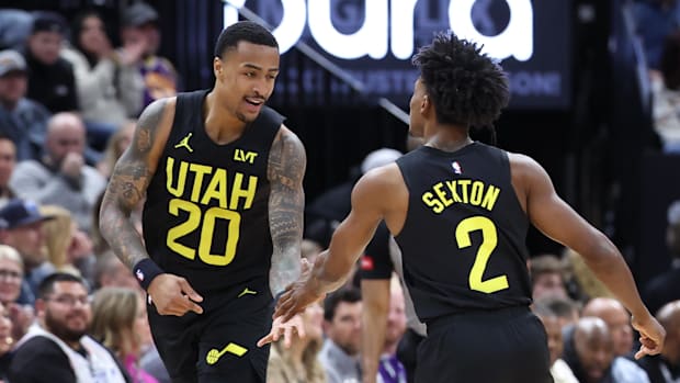 Utah Jazz striker John Collins (20) and the Collin Sexton (2) guard react to a room against the Atlanta Hawks