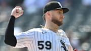 Chicago White Sox starting pitcher Sean Burke (59) throws against the San Diego Padres at Rate Field. 