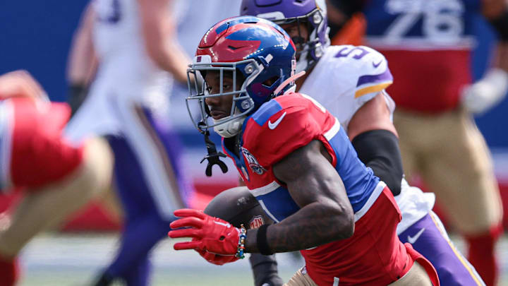 Sep 8, 2024; East Rutherford, New Jersey, USA; New York Giants wide receiver Malik Nabers (1) gains yards after catch during the first half against the Minnesota Vikings at MetLife Stadium. Mandatory Credit: Vincent Carchietta-Imagn Images