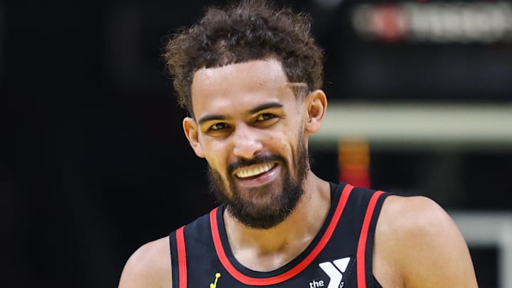 Trae Young #11 of the Atlanta Hawks reacts against the Cleveland Cavaliers.