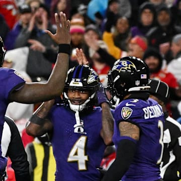 Baltimore Ravens quarterback Lamar Jackson (8) reacts after wide receiver Zay Flowers (4) fumbled for a turnover against the Kansas City Chiefs during the second half in the AFC Championship football game at M&T Bank Stadium. 