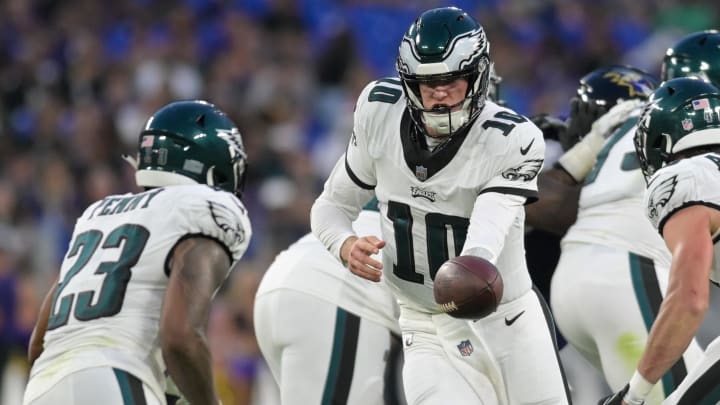 Aug 12, 2023; Baltimore, Maryland, USA;  Philadelphia Eagles quarterback Tanner McKee (10) hands the ball off to running back Rashaad Penny (23) during the first half against the Baltimore Ravens at M&T Bank Stadium. Mandatory Credit: Tommy Gilligan-USA TODAY Sports