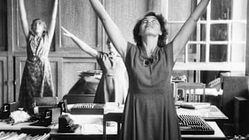 Workers Exercising at Their Desks