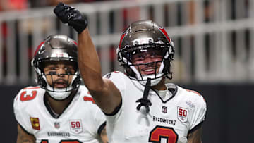 Sep 7, 2025; Atlanta, Georgia, USA; Tampa Bay Buccaneers wide receiver Emeka Egbuka (2) reacts after scoring a touchdown against the Atlanta Falcons during the second quarter at Mercedes-Benz Stadium. Mandatory Credit: Brett Davis-Imagn Images
