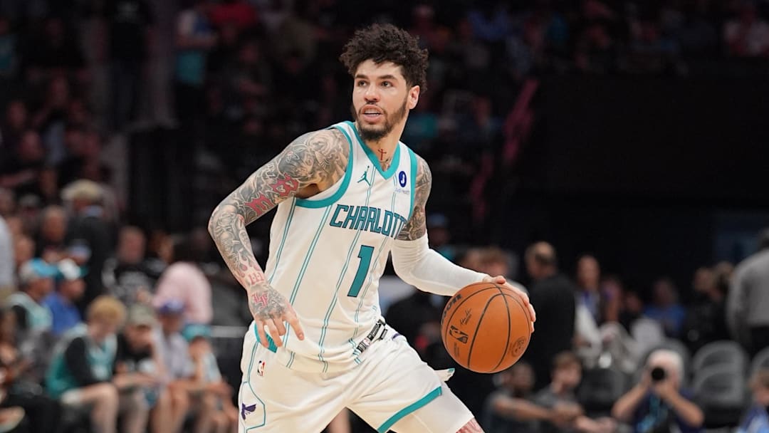 Apr 14, 2026; Charlotte, North Carolina, USA; Charlotte Hornets guard LaMelo Ball (1) moves the ball during the second half during the play-in rounds between the Charlotte Hornets and the Miami Heat of the 2026 NBA Playoffs at Spectrum Center. Mandatory Credit: Jim Dedmon-Imagn Images