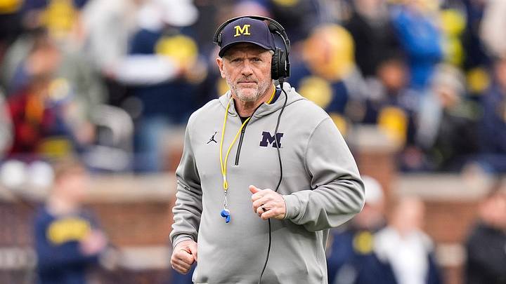 Michigan head coach Kyle Whittingham runs across the field during the spring game at Michigan Stadium in Ann Arbor on Saturday, April 18, 2026.