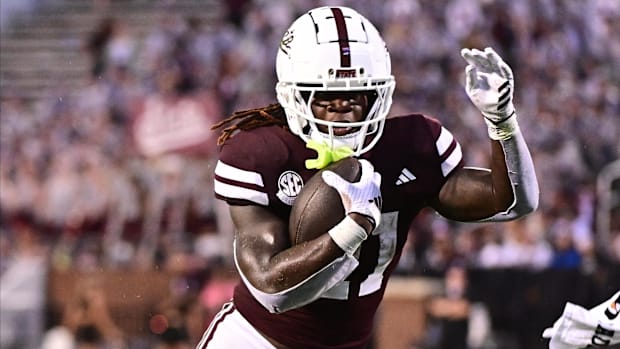 Mississippi State Bulldogs running back Davon Booth (21) runs the ball against the Eastern Kentucky Colonels.