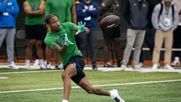Oregon wide receiver Tez Johnson catches a pass during the Oregon football’s Pro Day.