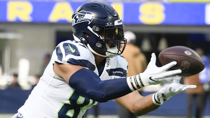 Nov 19, 2023; Inglewood, California, USA; Seattle Seahawks tight end Noah Fant (87) catches a pass during pre-game drills before an NFL game against the Los Angeles Rams at SoFi Stadium. Mandatory Credit: Robert Hanashiro-Imagn Images