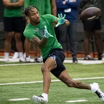 Oregon wide receiver Tez Johnson catches a pass during the Oregon football’s Pro Day Tuesday, March 18, 2025, at the Moshofsky Center in Eugene, Ore.