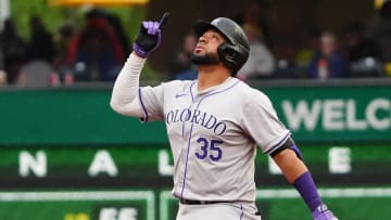 May 4, 2024; Pittsburgh, Pennsylvania, USA; Colorado Rockies catcher Elias Diaz (35) reacts to hitting a double against the Pittsburgh Pirates during the fifth inning at PNC Park.