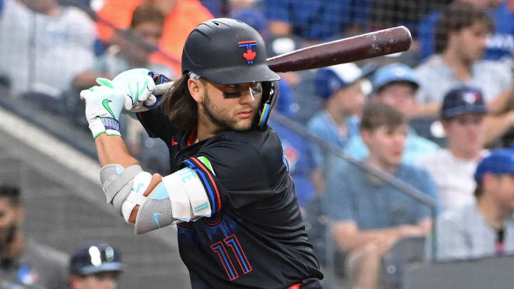 Jul 3, 2024; Toronto, Ontario, CAN; Toronto Blue Jays shortstop Bo Bichette (11) bats against the Houston Astros at Rogers Centre.