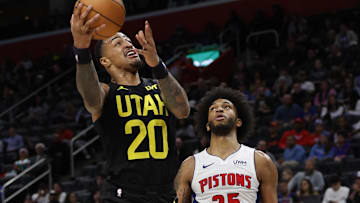 Dec 21, 2023; Detroit, Michigan, USA;  Utah Jazz forward John Collins (20) shoots on Detroit Pistons
