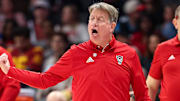 Nov 9, 2025; Charlotte, North Carolina, USA; NC State Wolfpack head coach Wes Moore in action against the Southern California Trojans during the fourth quarter of the Ally Tipoff game at Spectrum Center. Mandatory Credit: Cory Knowlton-Imagn Images